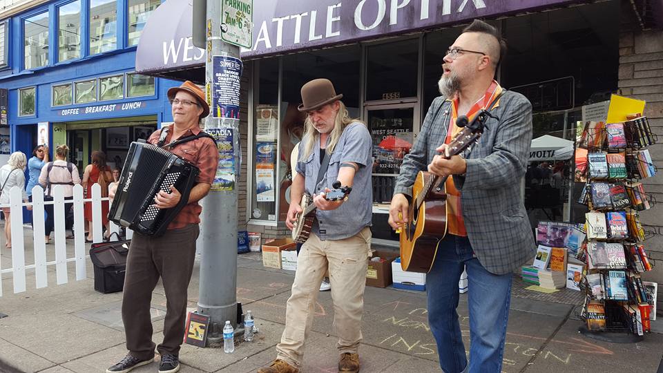 South Sound Tug & Barge live at the West Seattle Street Fest, July 2016 (i. to r. Charley Rowan, Steve Duda, Scott M.X. Turner)